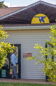 Tourist entering visitor center at Prime Hook NWR photo