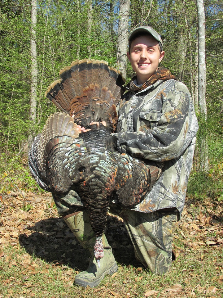 Youth hunter with Wild Turkey photo