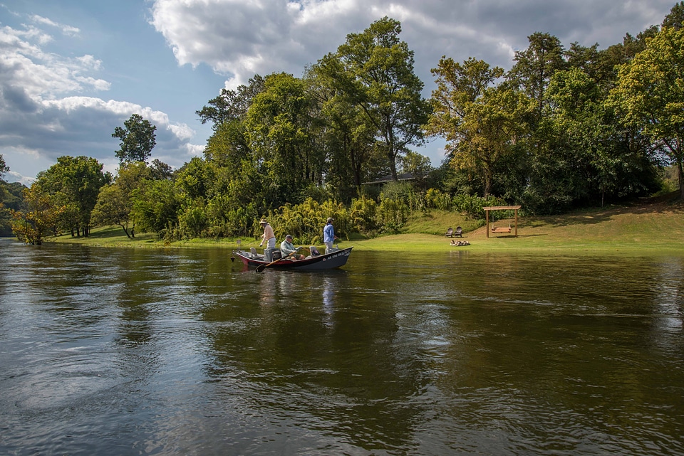 Group fly fishing from drift boat on White River-1