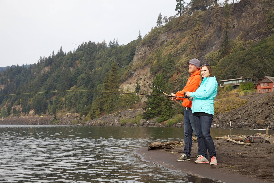 Young couple fishes for Fall Salmon-1