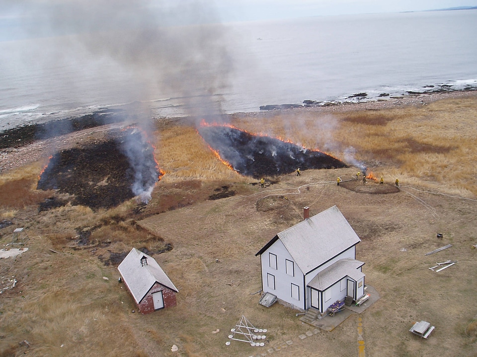 Prescribed fire near homes on coast