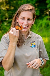 Service employee with Monarch butterfly-1