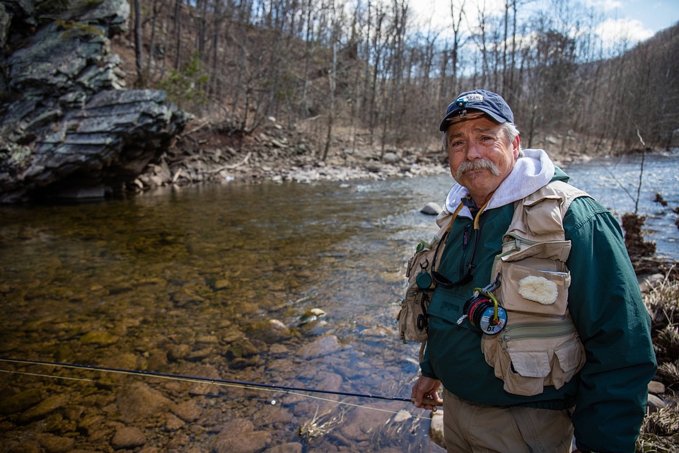 Fisherman fly fishing in the Seneca Creek