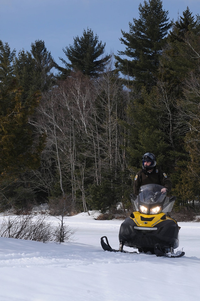 Service Law Enforcement Officer on a snowmobile