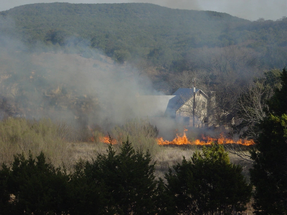 Prescribed fire with house