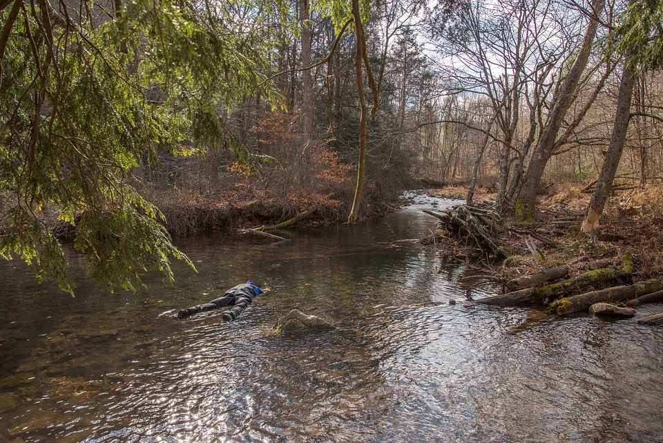 Photographer taking pictures of brook trout in Seneca Creek-4