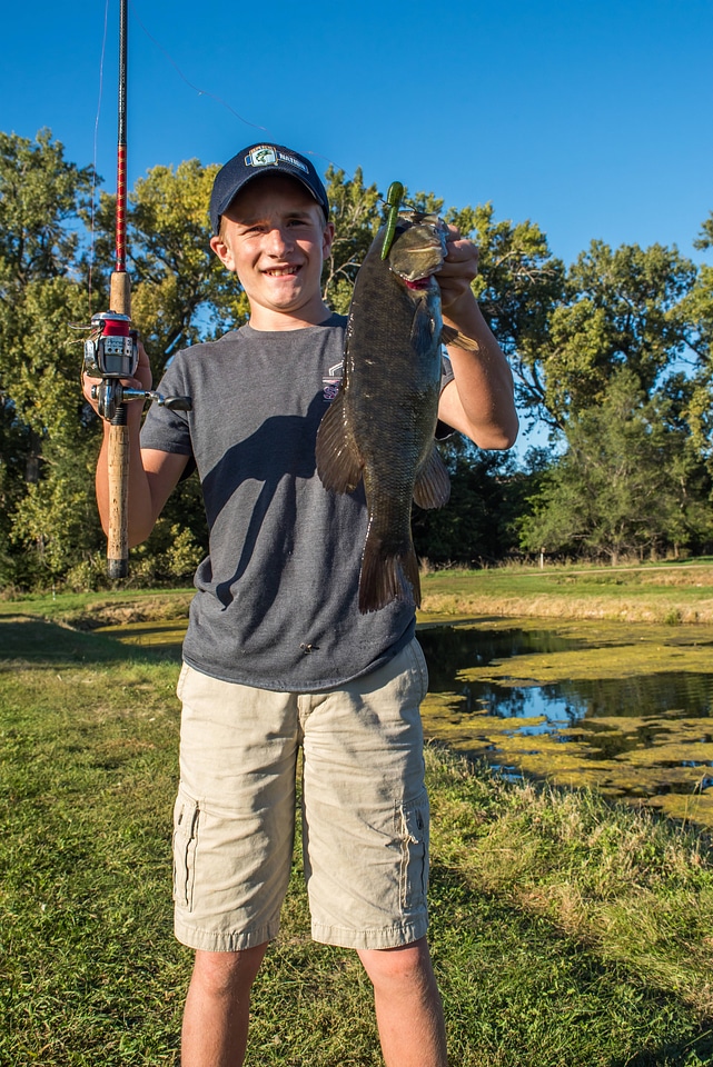 Boy with smallmouth bass-5
