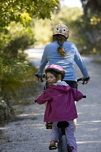 Biking with a child on a refuge trail