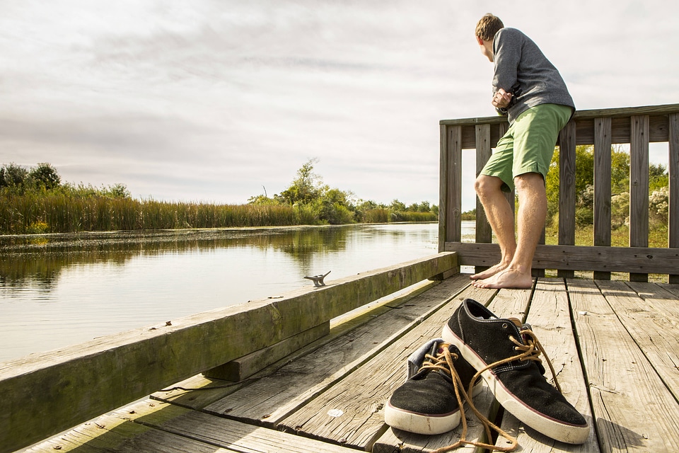 Refuge visitor relaxes on the dock