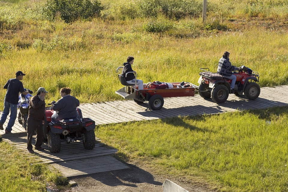 Using 4-wheelers to transport people in an emergency situation in Alaska