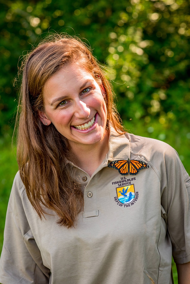 Service employee with Monarch butterfly-1