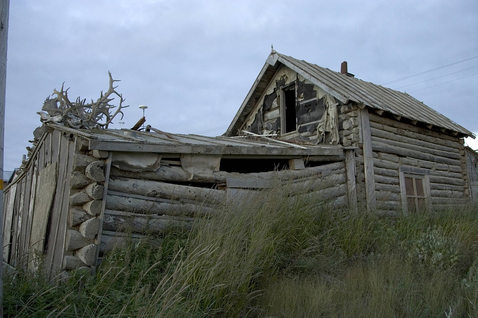 Wooden building with a covering of antlers in Alaska