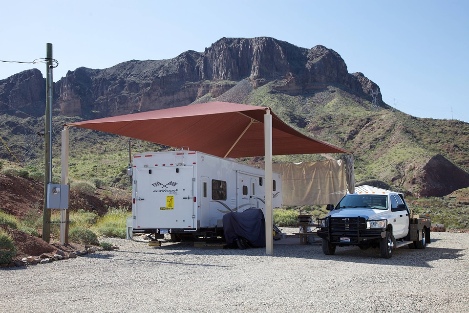 Trailer pad with roof awning for Refuge volunteer