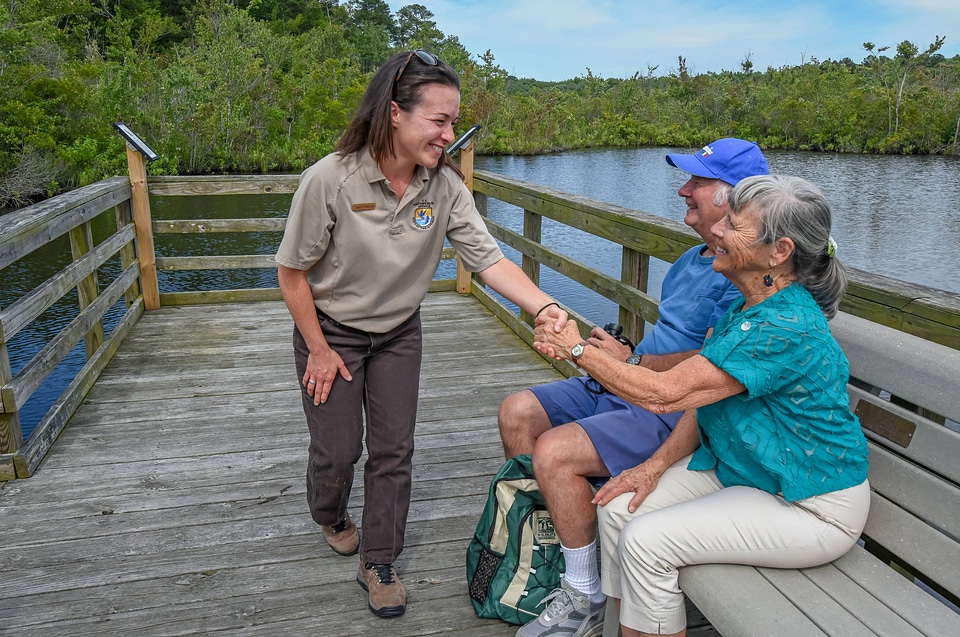 FWS Visitor services staffer greets visitors on boardwalk-1