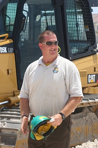Employee and bulldozer