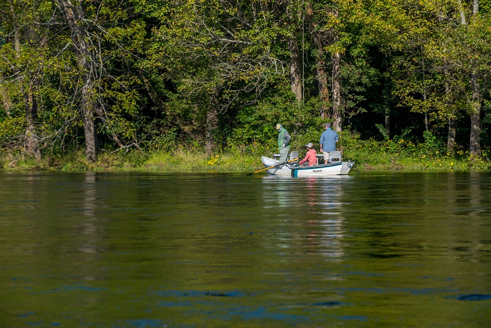 Group fly fishing from drift boat on White River-1