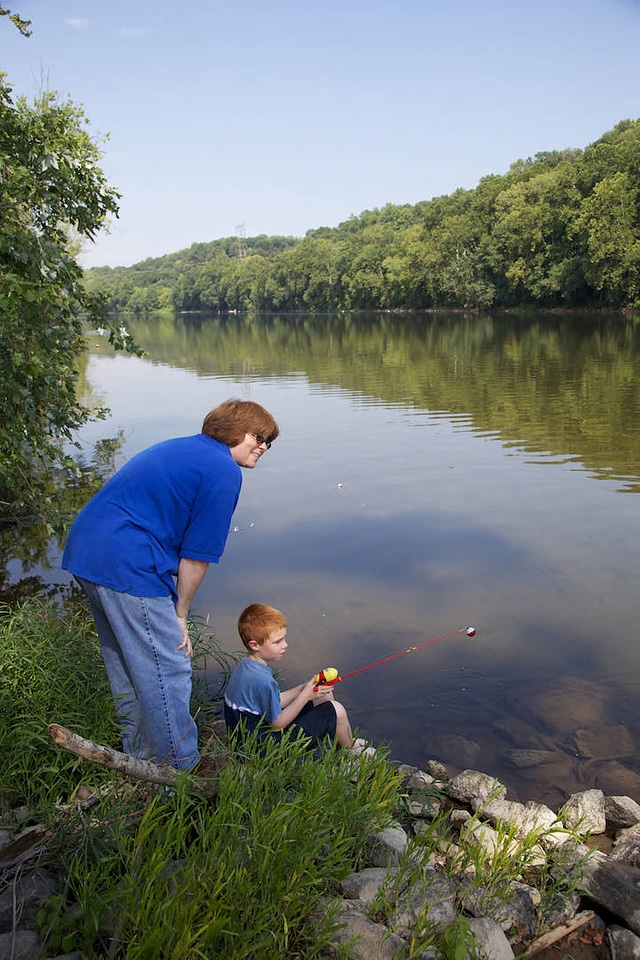 Mother and son fishing along the Potomac River