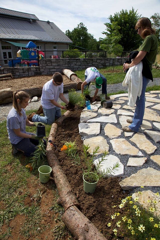 Planting flowers in new outdoor classroom-3