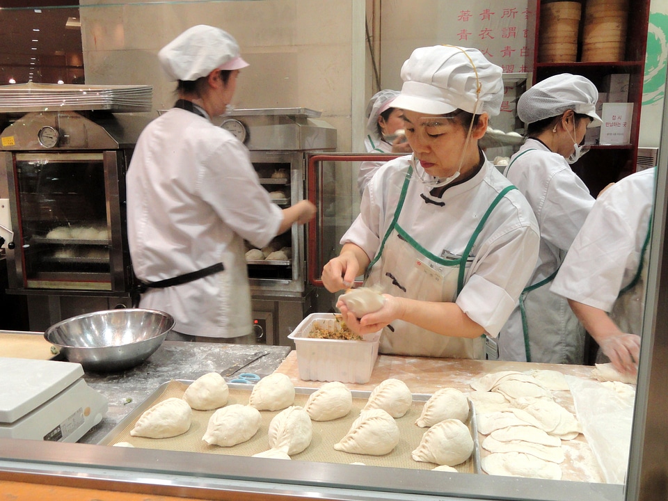 Dumplings women working