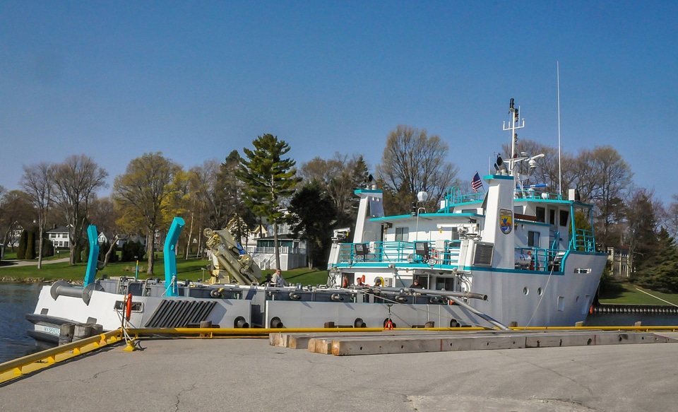 FWS staff loading juvenile lake trout onto MV Spencer Baird-3