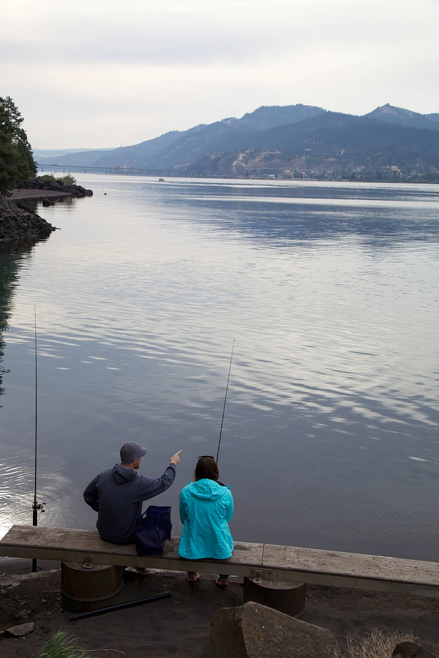 Anglers on the Columbia River shoreline