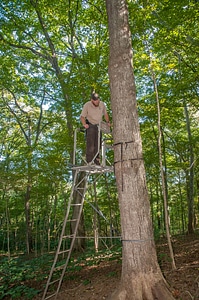 NCTC land management specialist inspecting deer stand for safety-2