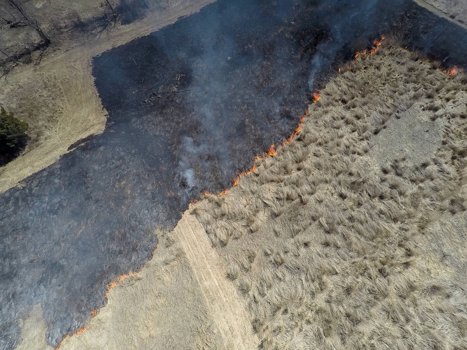 Drone taking aerial photograph of a perscribed burn-1