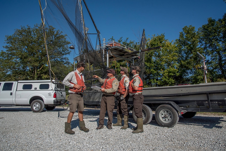 Crew of the U.S. Fish and Wildlife Service boat, The Magna Carpa, safety briefing-4
