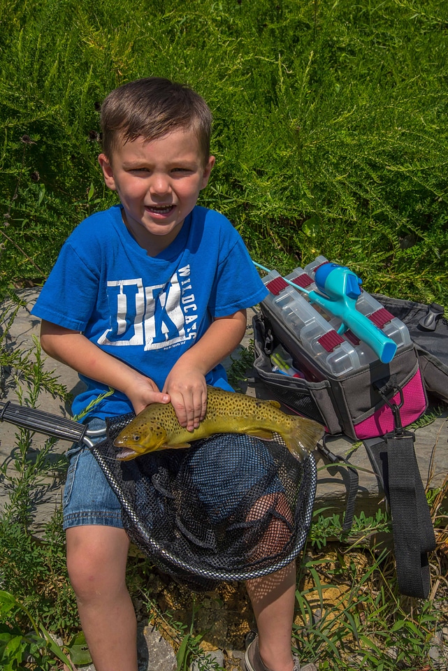 Little boy holding brown trout-4