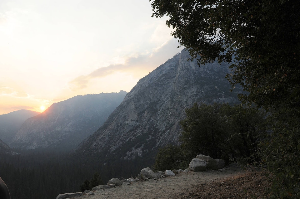 Sun setting behind mountains