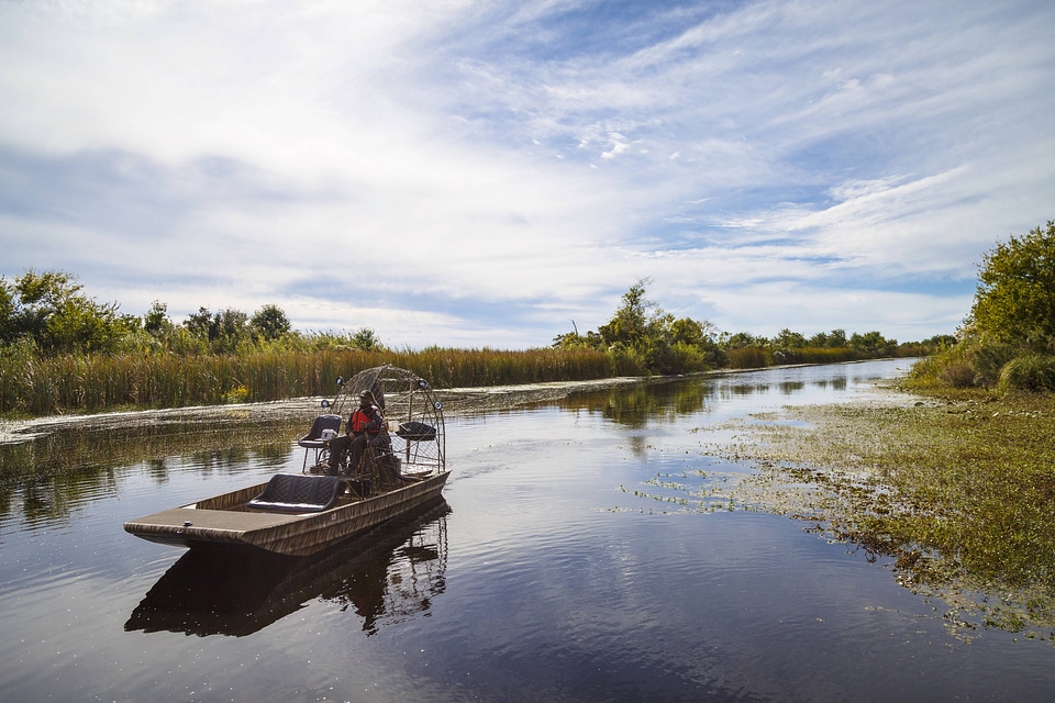 Employees operate an airboat at Bayou Sauvage NWR-1