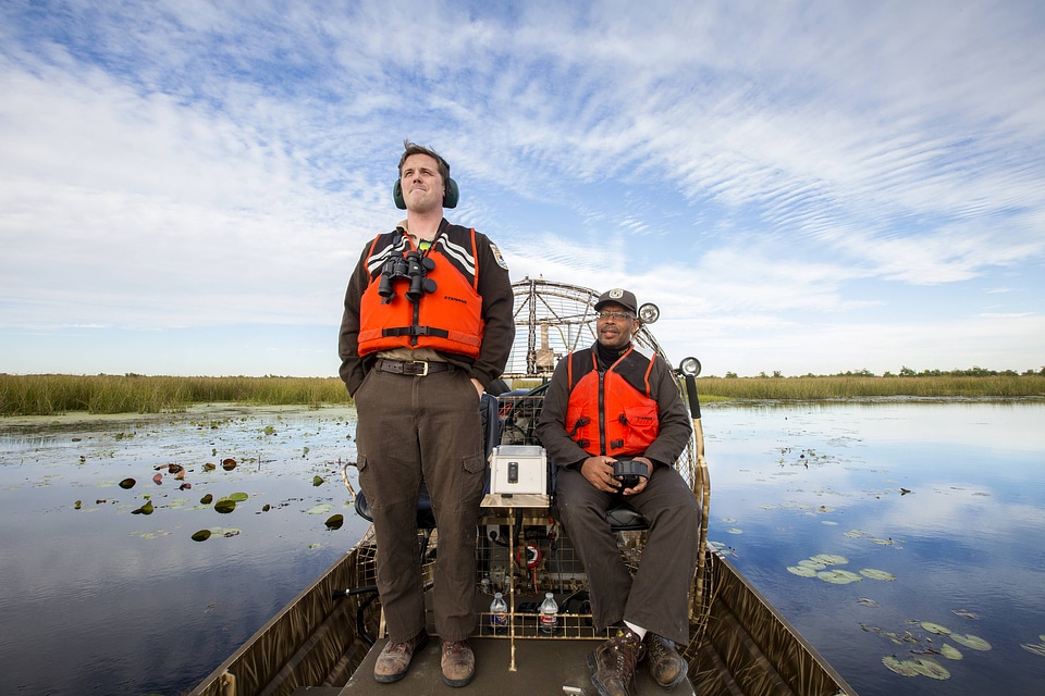 Employees operate an airboat at Bayou Sauvage NWR-3