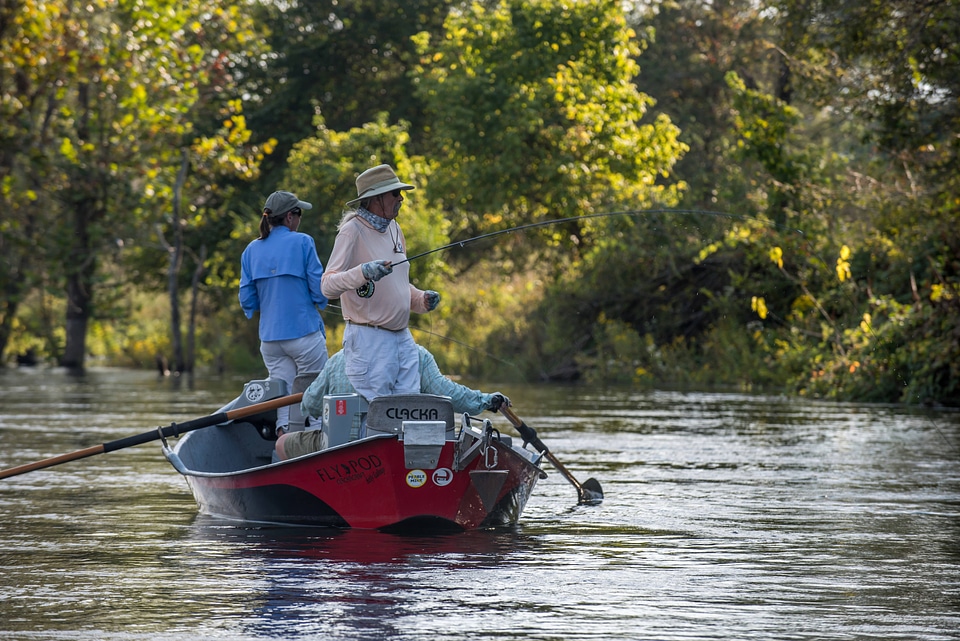 Group fly fishing from drift boat on White River-1