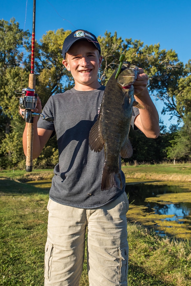 Boy with smallmouth bass-1
