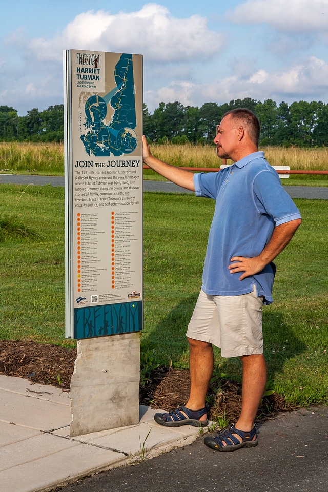 Harriet Tubman sign at Blackwater NWR with visitor
