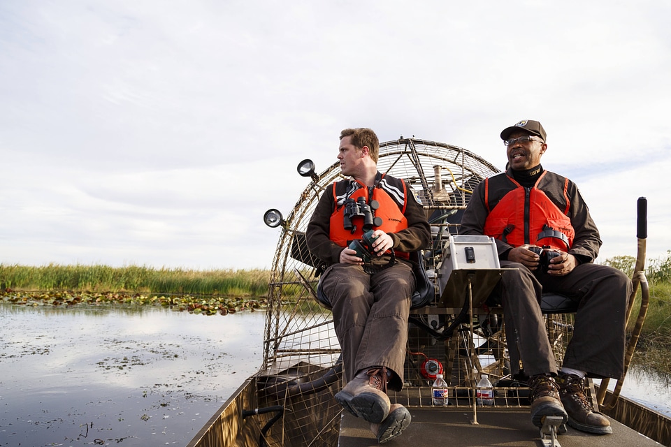 Employees operate an airboat at Bayou Sauvage NWR-3