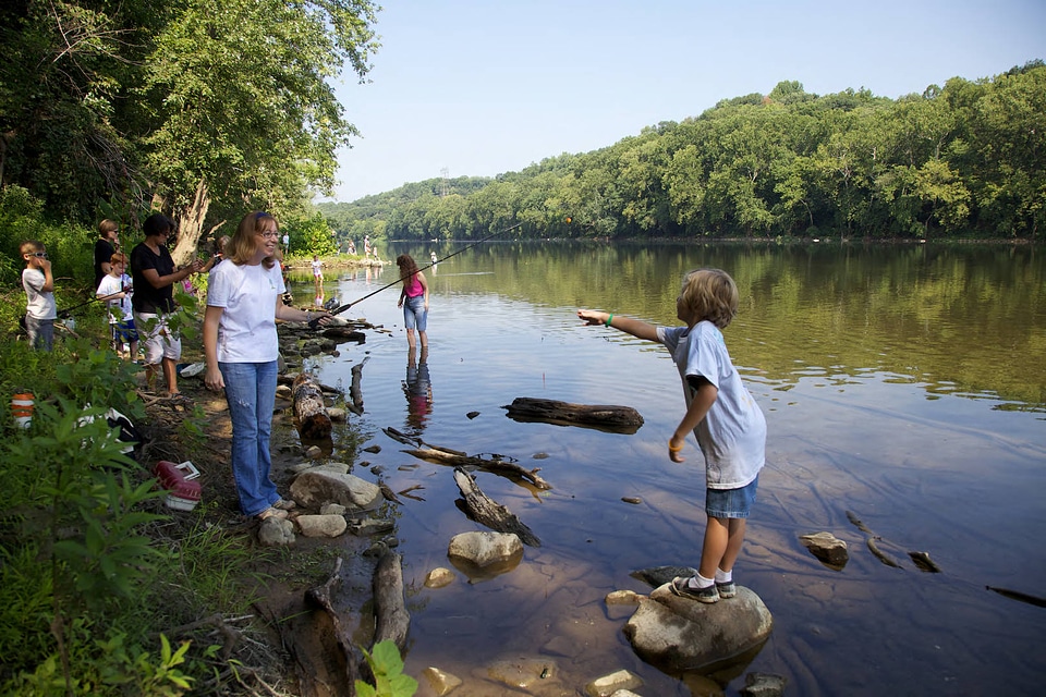 Fishing group of children and adults