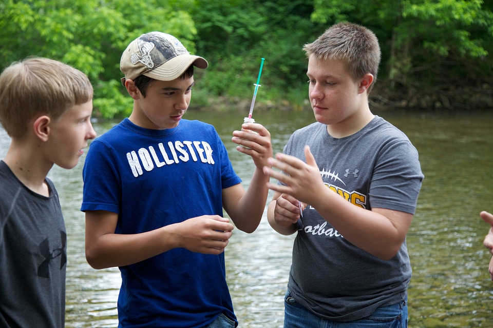 Students testing water quality
