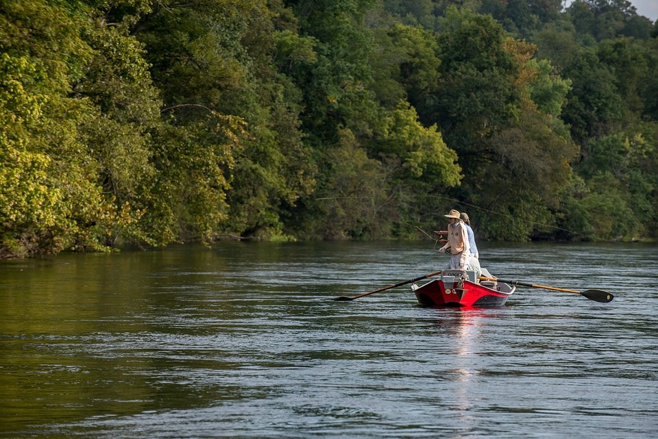 Group fly fishing from drift boat on White River-1
