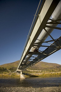 Trans Alaska oil pipeline crossing South fork Koyukuk River, draining into Kanuti National Wildlife Refuge photo