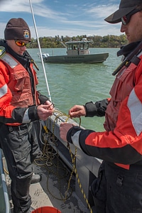 USFWS Fisheries crew baiting lines for lake sturgeon-4
