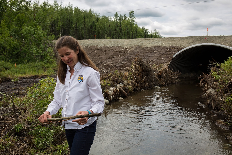 Fish passage engineer inspects new salmon friendly culvert-1