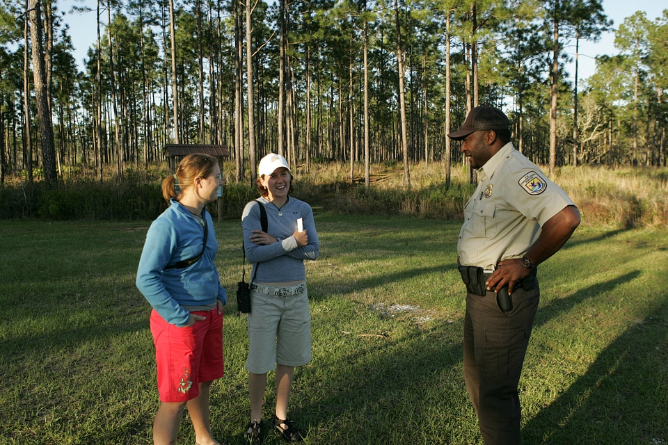 Fish and Wildlife Service Law Enforcement Officer assists visitors