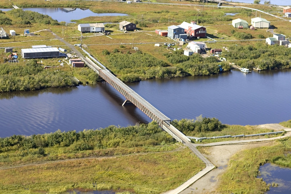 View of a bridge leading to a village