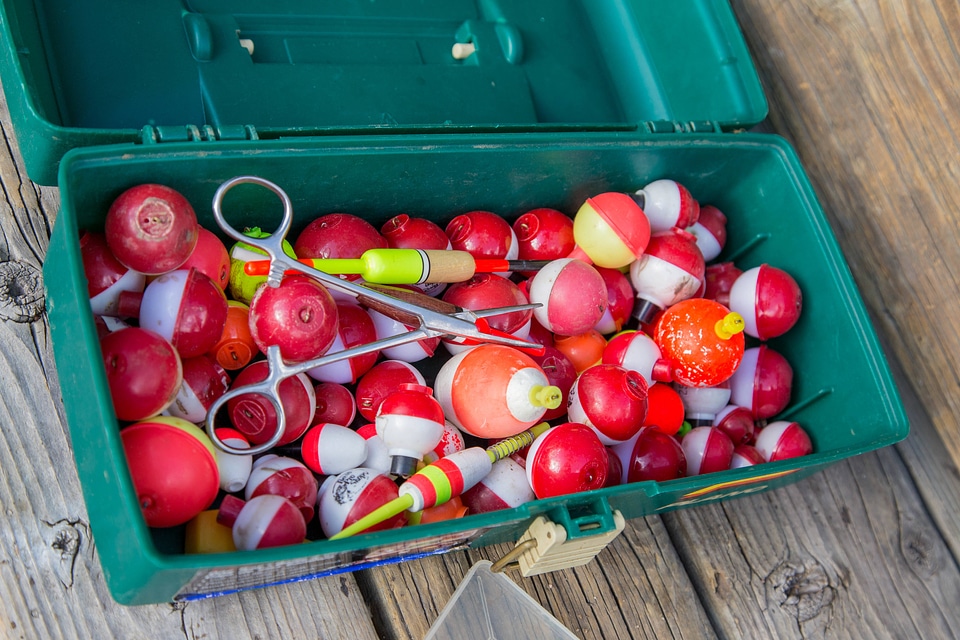 Fishing bobbers in a tackle box
