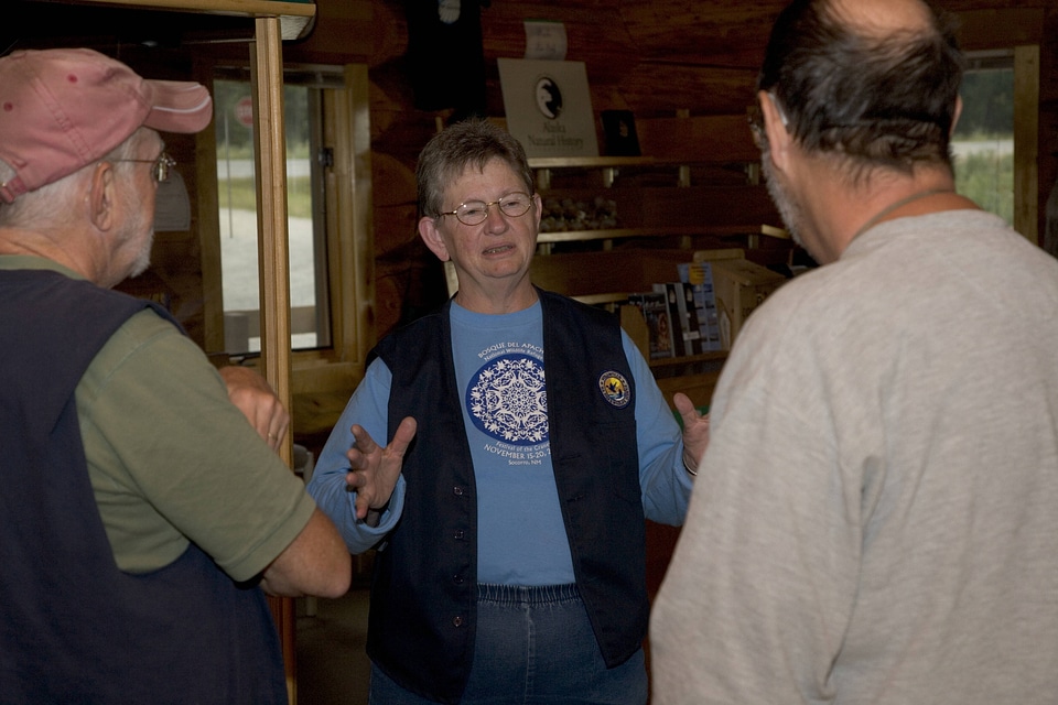 Volunteer with visitors
