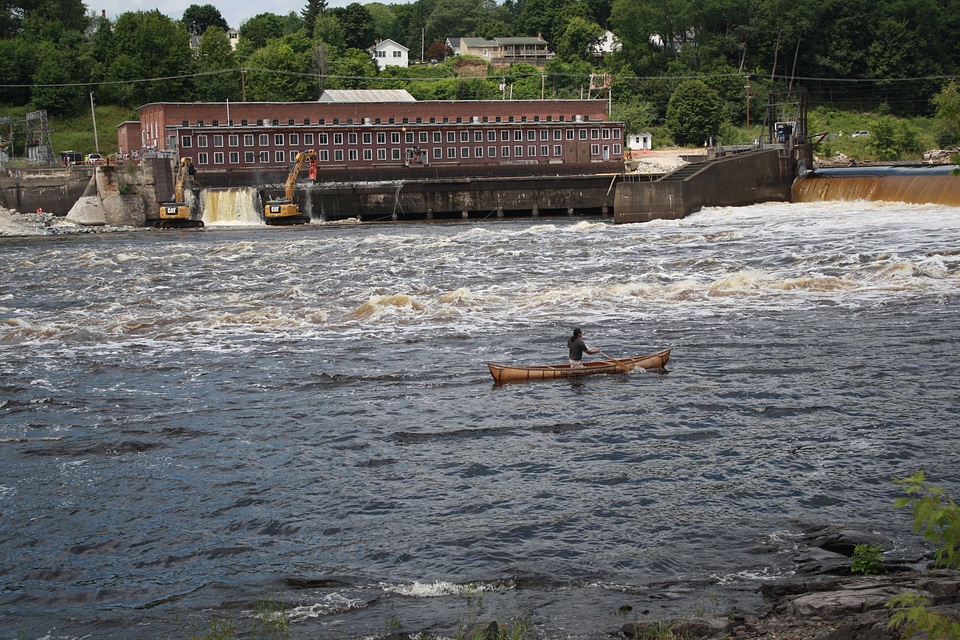 Paddling a traditional birch-bark canoe 