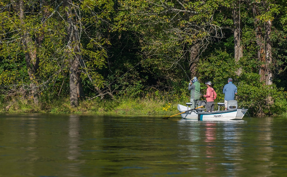 Group fly fishing from drift boat on White River-1