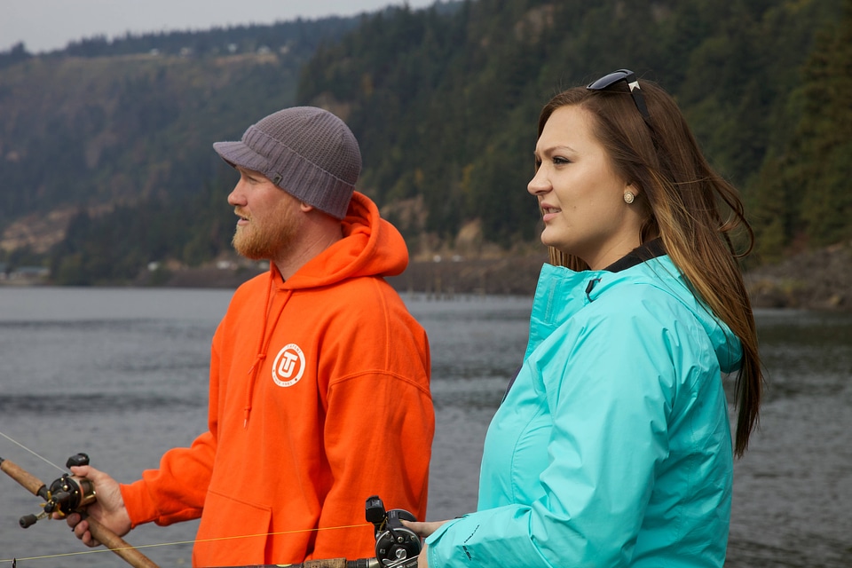Young couple fishes on the Columbia River
