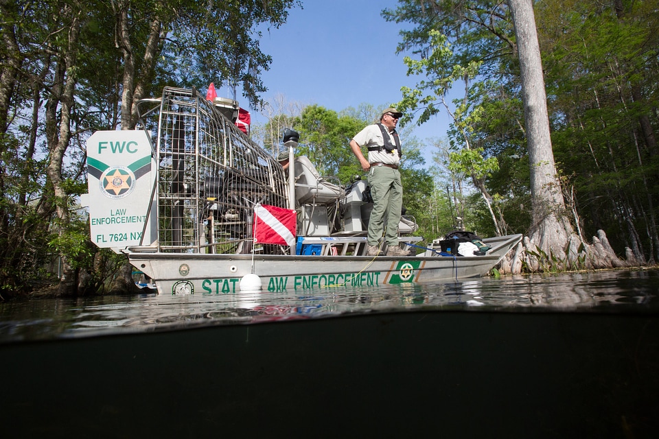Biologist monitors aquatic plants-2